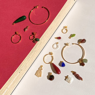 Charms en pierres et perles naturelles interchangeables pour créoles Catherine, montrant la personnalisation possible et la brillance des pierres naturelles.